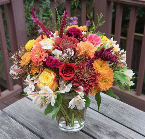 Seasonal Flowers In A Vase Arrangement With Fall Color Tones Fresh Flowers Arrangements