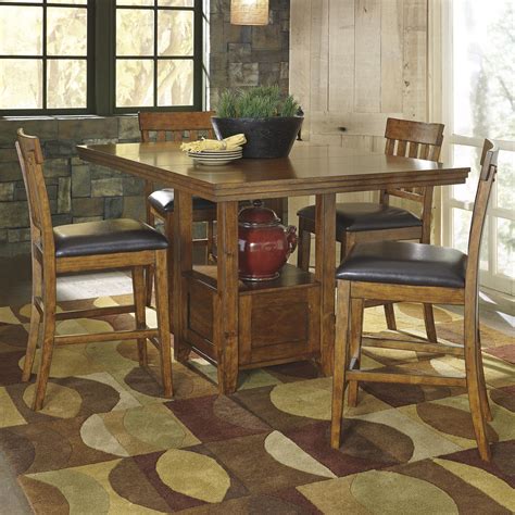 Dine in grand traditional style with the north shore dining table from the north shore dining room collection by ashley furniture. Ashley Signature Design Ralene Casual Dining Table Set with 4 Bar Stools | Dunk & Bright ...