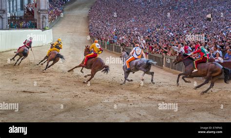 The Palio Di Siena Horse Race On Piazza Del Campo Siena Tuscany