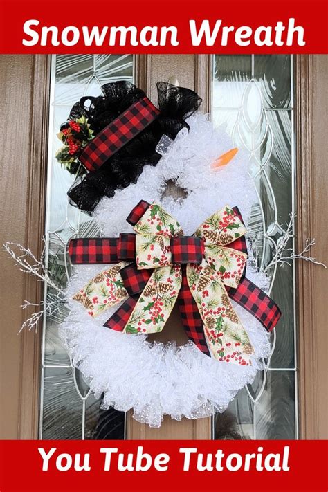 A Snowman Wreath On The Front Door With Words Below It That Reads You