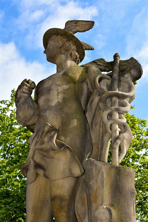 Mercury Statue At Børsen In Copenhagen Denmark Encircle Photos