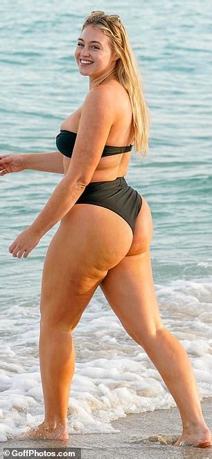 Iskra Lawrence Flaunts Her Curves As She Takes Off Black Mini Dress To