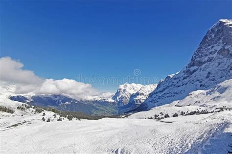 Peak Of Switzerland Grindelwald Snow Mountain With Blue Sky Stock Image