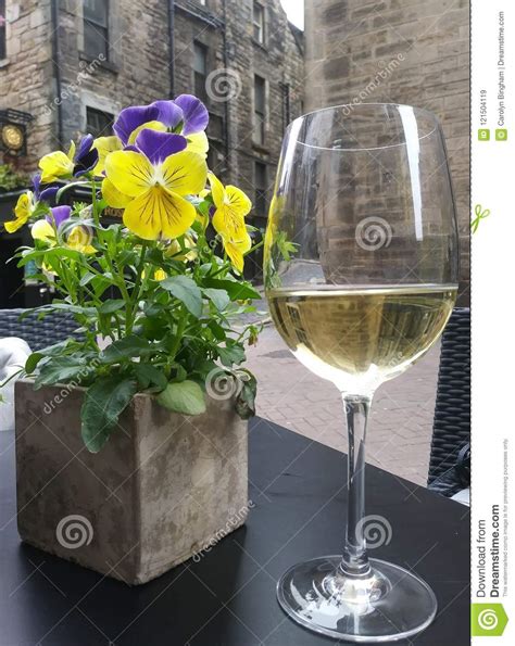 Flowers and White Wine stock image. Image of adult, rose - 121504119