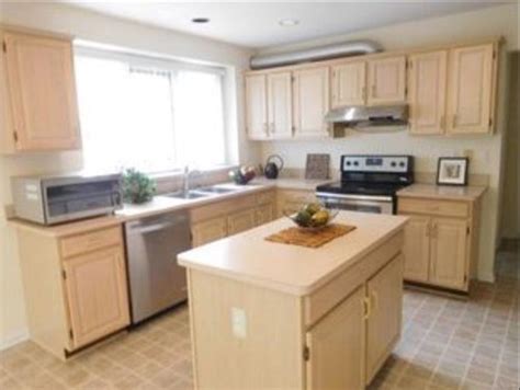Maybe you would like to learn more about one of these? Cream walls white cabinets