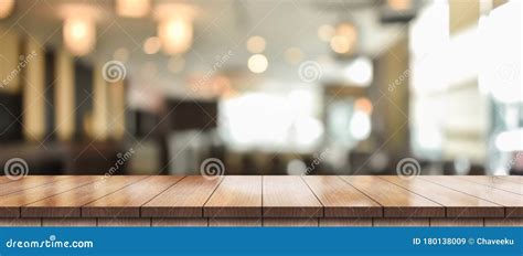Empty Wooden Table Top With Lights Bokeh On Blur Restaurant Background