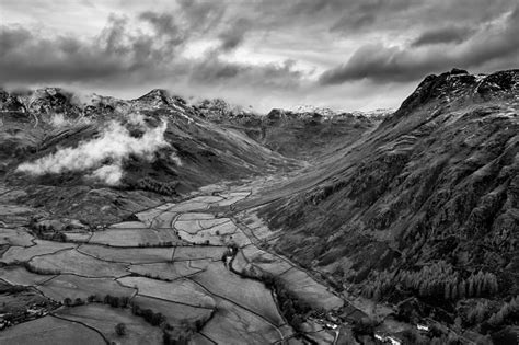 Stunning Flying Drone Black And White Landscape Image Of Langdale Pikes