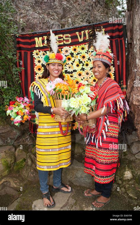 Two Beautiful Filipina Women Dress In Traditional Ifugao Clothing At
