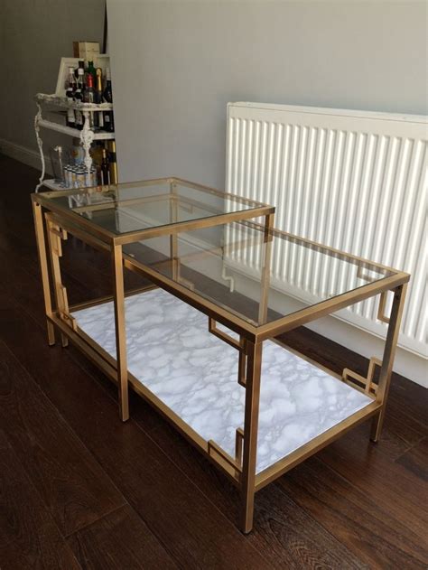 Ceres from designs by ceres is going to show you how to take an ikea coffee table and in a snap transform it into a glam piece… plus she shares some ideas to kick it up even further such as adding marble or contact paper of your choice to the bottom piece. DIY: GOLD AND FAUX MARBLE COFFEE TABLE IKEA HACK | Diy ...