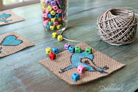 Make diy decorations for baby showers with these ideas for cake, banners, favors, invitations and games to play. Diy burlap bird banner for a baby shower - Debbiedoos