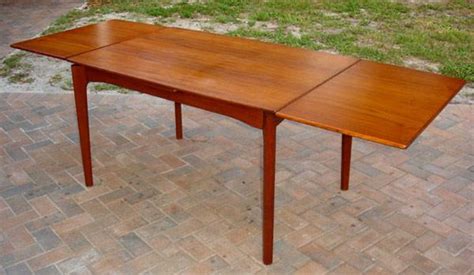 This table is suitable for both indoor and outdoor use and it pairs beautifully with many styles of chairs. Vintage Danish Teak Dining Table