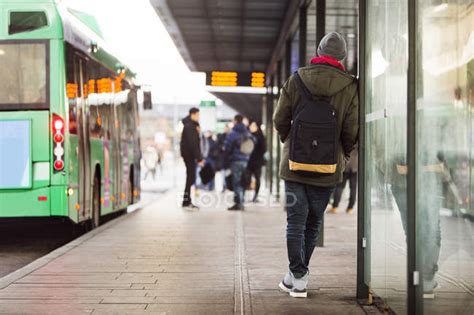 Commuters Many People Waiting At A Bus Stop Way Station