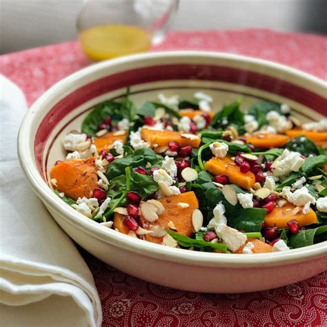 Spinach And Persimmon Salad With Goat Cheese And Pomegranate Recipe