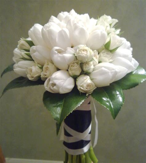 Tulips and rose wedding bouquets pictures. White tulips cream rose buds camellia leaves bridal ...