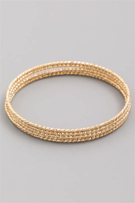 Free shipping & amazing selection. GOLD Textured Thin Bangle Bracelet Set - Bangle/Cuff