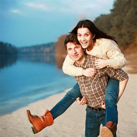 Free Photo Joyful Couple In Love Having Fun On Lonely Lake