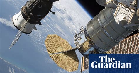russian crew to inspect mysterious hole in soyuz spacecraft world news the guardian