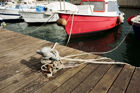 Closeup Of A Boat Tied With A Rope On A Mooring Stock Photo Image Of