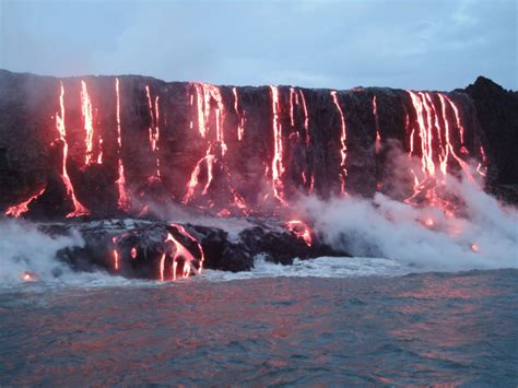 The Lava Flows Into The Ocean As It Erupts