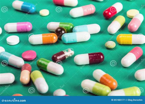 Different Color Pills Pharmaceutical Medicine And Capsules Stock Image