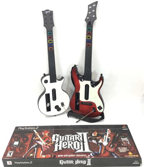 Lot Playstation 2 Guitar Hero Set With Guitars
