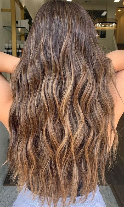 30 Cute Ways To Wear Brown Hair This Autumn 2021 Beachy Brown Hair With Blonde Highlights