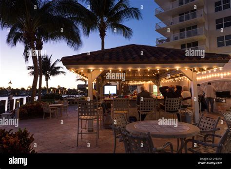 Tenants Enjoying the Tiki Bar Cabana, The Venetian Apartment Buildings