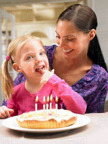 Mother And Daughter Celebrating Birthday Stock Photo Dissolve