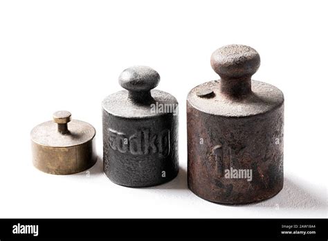 Old Rustic Metal Weights On White Background Stock Photo Alamy