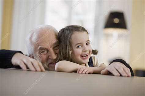 Old Man And Young Girl Smiling Stock Image F0037603 Science Photo Library
