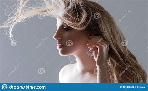 Portrait Of A Beautiful Young Woman With Flying Curls Girl With
