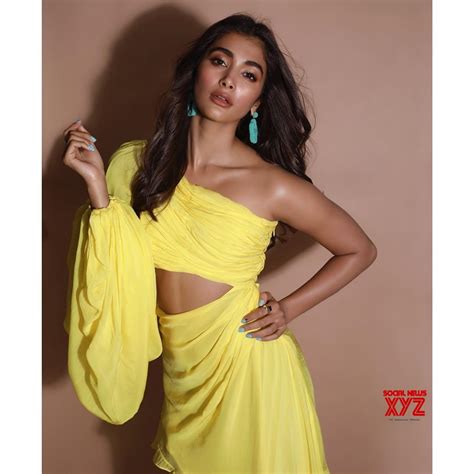 Actress Pooja Hegde Latest Sexy Stills In Not So Mellow Yellow Dress