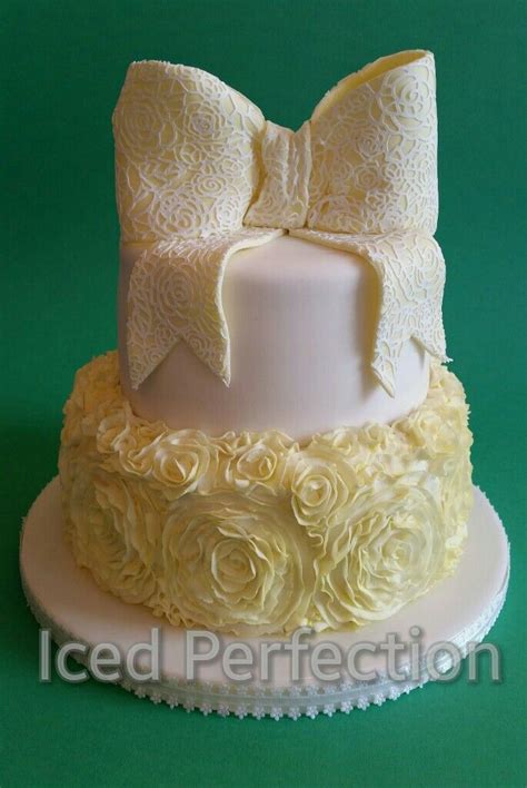 Ruffle Roses On The Bottom Tier And A Cake Lace Covered Bow On The Too