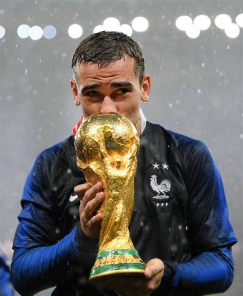 Antoine Griezmann Of France Celebrates With The World Cup Trophy