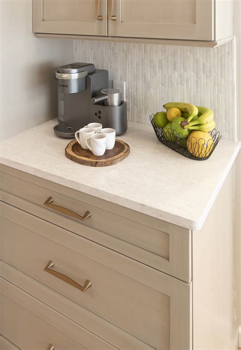 If you truly need a desk but aren't the type to open mail, pay bills and file paperwork every day, consider tucking the desk. Hamden Kitchen - Coffee Nook | Viking Kitchen Cabinets