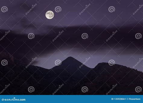 Silhouette Of Mountains On The Full Moon And Night Sky Background Stock