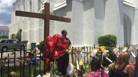 Charleston Victim Funerals Begin As Confederate Flag Falls In Other