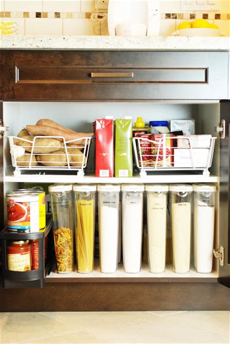 Organizing kitchen cabinets organize 365 cabinet organization home services ideas for storage on the inside of by small how to your and pantry feed me phoebe 21 ways declutter tips drawers cookware judge 5 quick five spot green living container simcoe street cupboards food dollar cupboard. How to Organize Kitchen Cabinets - Clean and Scentsible
