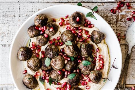 Developed with the eat smarter nutritionists and professional chefs. Spiced Lamb Meatballs with Hummus is a Middle Eastern appetizer or full meal served with fresh ...