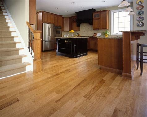 One of the best ways to make your brown cabinetry truly pop is by using gleaming white subway tile on your walls. 20 Beautiful Kitchens With Wood Laminate Flooring