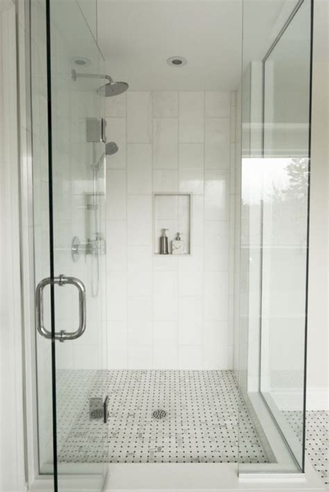 Bathroom interior with white walls, a double sink standing on white countertops and a two vertical mirrors. 43 Stand Up Shower Design Ideas to Copy Right Now ...