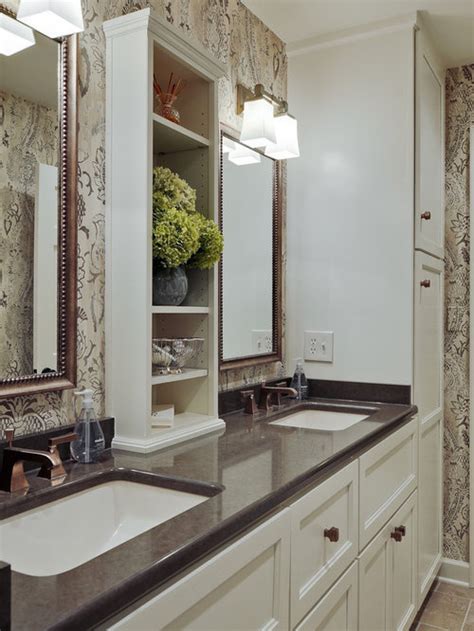 A wall mounted cabinet between the two vanities houses everyday beauty products, toothbrushes, etc. Double Vanity Linen Towers | Houzz