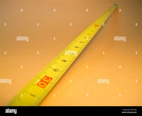 Metal Measuring Tape Marked In Centimeters Stock Photo Alamy