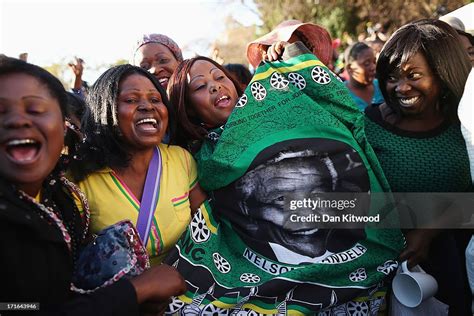 Supporters Of Former South African President Nelson Mandela Hold A