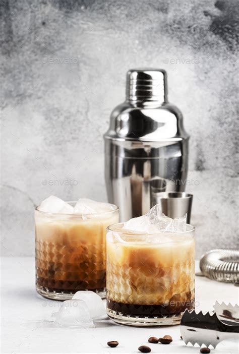 white russian cocktail trendy alcoholic drink with vodka coffee liqueur cream and ice stock