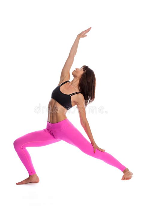 De Mooie Vrouw In Yoga Stelt Omgekeerde Plankpositie Stock
