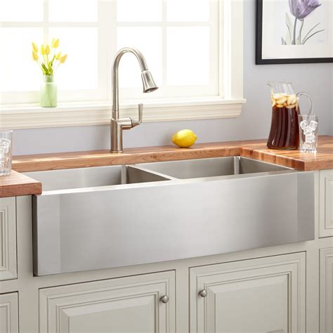 Kohler stainless steel kitchen sink use silent shield technology to reduce the irritating noise. 42" Ackerman Double-Bowl Stainless Steel Farmhouse Sink ...