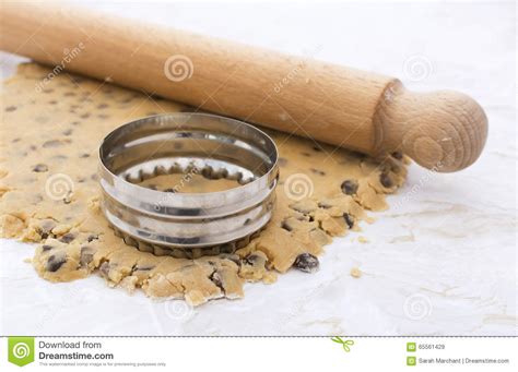 Cookie Cutter And Rolling Pin On Cookie Dough Stock Image