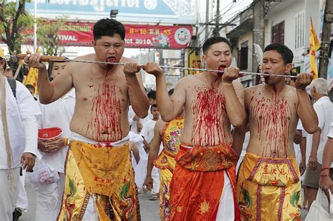 Hundreds of worshippers gather along a small beach at tuas awaiting the arrival of the nine mediums to welcome the nine. Nine Emperor Gods Festival - Wikipedia