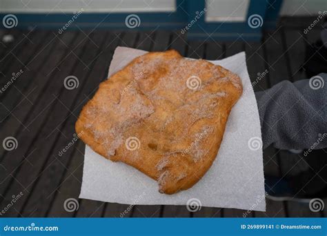 Large Fried Dough Elephant Ear Covered In Sugar And Cinnamon Stock